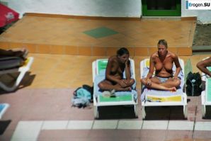 Girls sunbathe topless near the pool. Part 2. Thumb 17