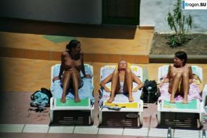 Girls sunbathe topless near the pool. Part 2. Thumb 39