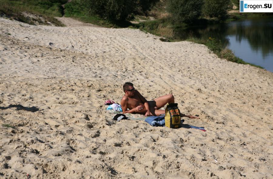 Three nudists on the river bank. Photo 5
