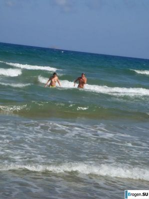 fun on a nudist beach. Thumb 10