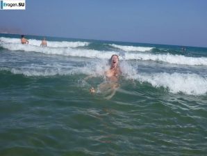 fun on a nudist beach. Thumb 23