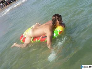 fun on a nudist beach. Thumb 27