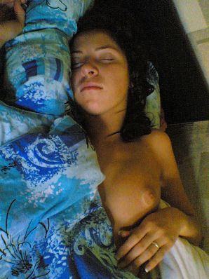 Brunette in revealing outfits and without anything. Thumb 29