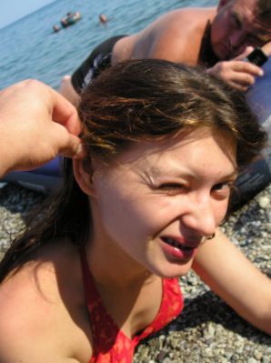 without a swimsuit on a rocky shore. Thumb 18