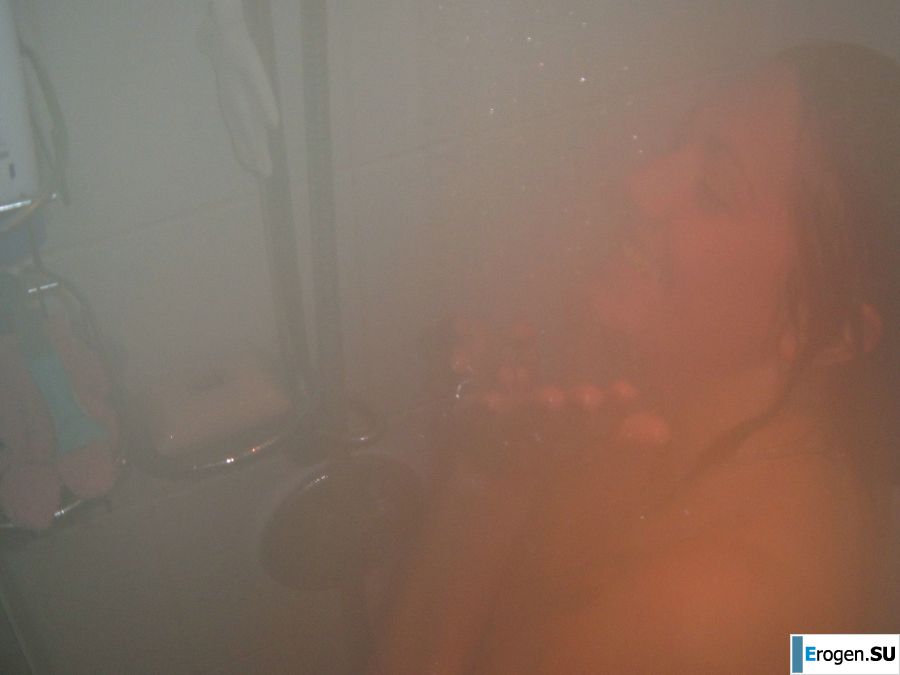 A woman spreads her legs on the bed and in the bathroom. Photo 22