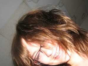 A girl with large breasts poses in clothes and then undresses. Thumb 10
