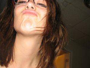 A girl with large breasts poses in clothes and then undresses. Thumb 11