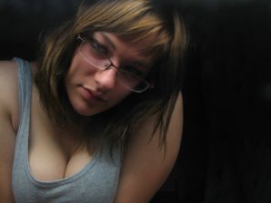 A girl with large breasts poses in clothes and then undresses. Thumb 17