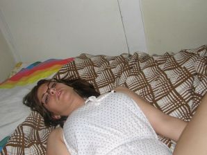 A girl with large breasts poses in clothes and then undresses. Thumb 32