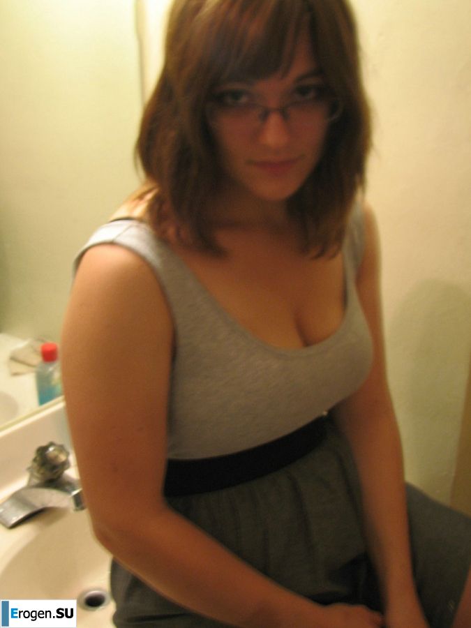 A girl with large breasts poses in clothes and then undresses. Part 2. Slide 13
