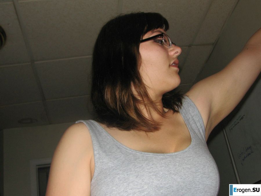 A girl with large breasts poses in clothes and then undresses. Part 2. Slide 14