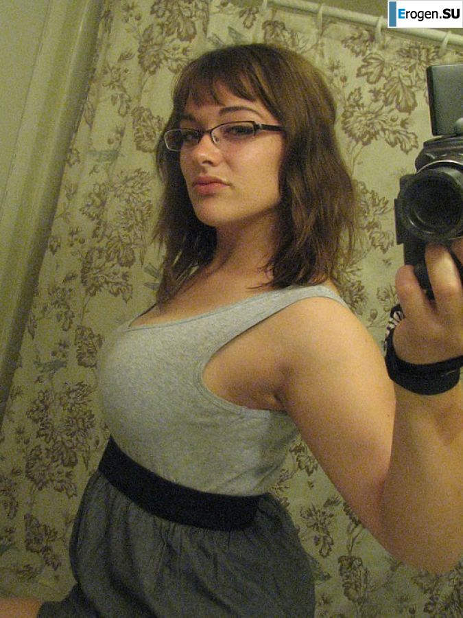 A girl with large breasts poses in clothes and then undresses. Part 2. Slide 15