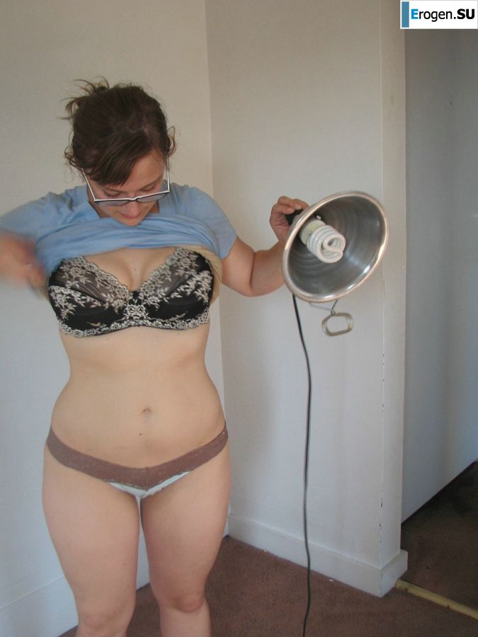 A girl with large breasts poses in clothes and then undresses. Part 2. Slide 2