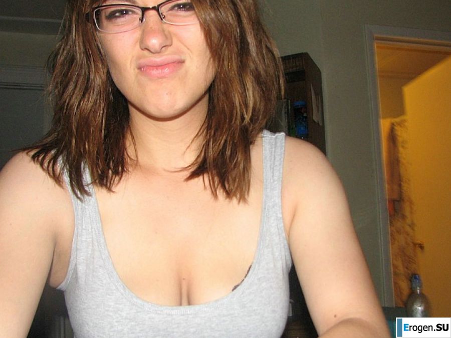 A girl with large breasts poses in clothes and then undresses. Part 2. Slide 20