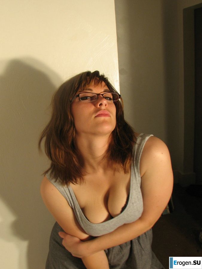 A girl with large breasts poses in clothes and then undresses. Part 2. Slide 26