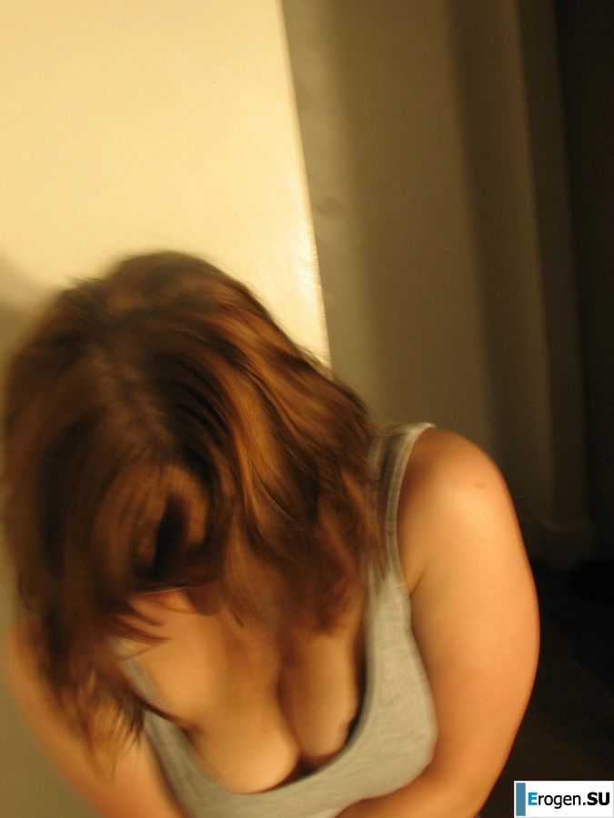 A girl with large breasts poses in clothes and then undresses. Part 2. Slide 27