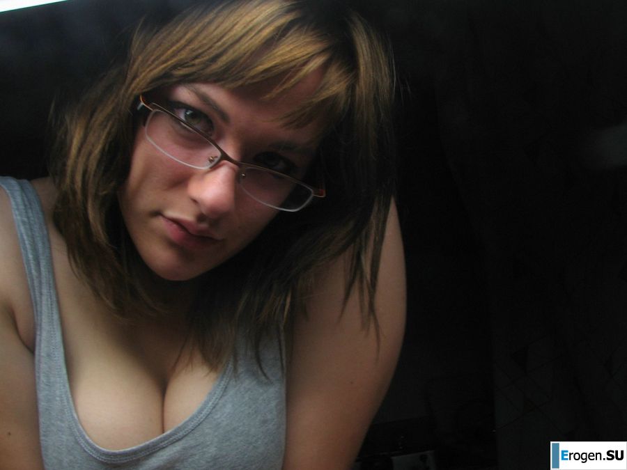 A girl with large breasts poses in clothes and then undresses. Part 2. Slide 28