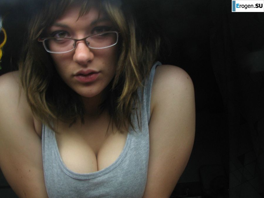 A girl with large breasts poses in clothes and then undresses. Part 2. Slide 30