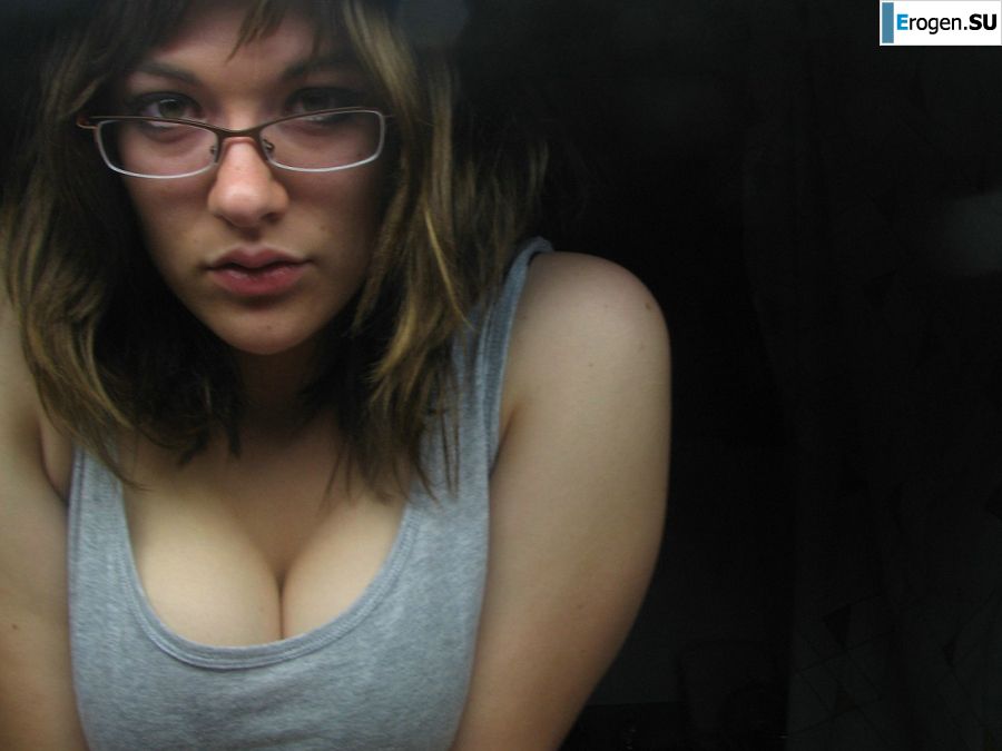 A girl with large breasts poses in clothes and then undresses. Part 2. Slide 31