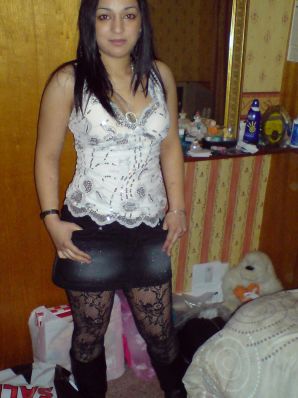 An Asian woman is lying on a bed in her underwear and showing off her ass. Thumb 23