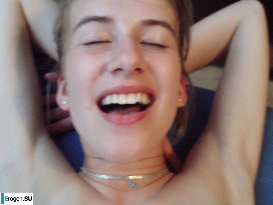 A woman caresses herself spreading her legs apart on the camera. Slide 13