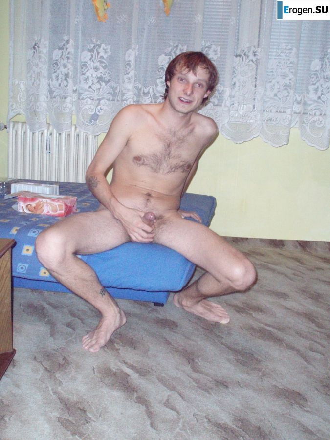 A woman caresses herself spreading her legs apart on the camera. Slide 31