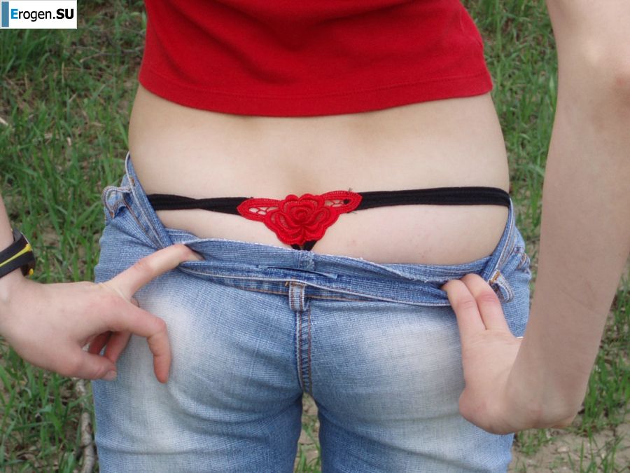 A woman caresses herself spreading her legs apart on the camera. Slide 5