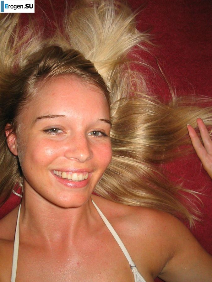 A young blonde in stockings spreads her legs on the sofa. Slide 35