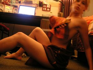 A sexy girl lights up at a party in fishnet stockings. Thumb 22